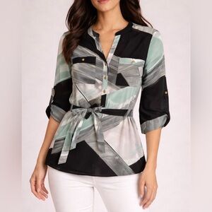 Calvin Klein Women’s Size Medium Blouse with matching belt.
